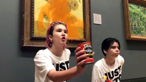Two Just Stop Oil protesters have thrown soup at Vincent Van Gogh’s famous 1888 painting Sunflowers at the National Gallery in London, on Friday, Oct. 14, 2022.