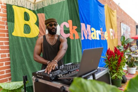 DJ Kènè ō doing a set at Black Market Flea